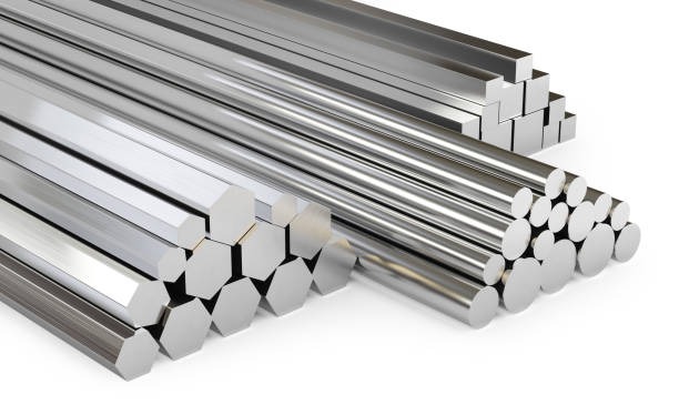 Polished stainless steel bars in hexagonal and round shapes.
